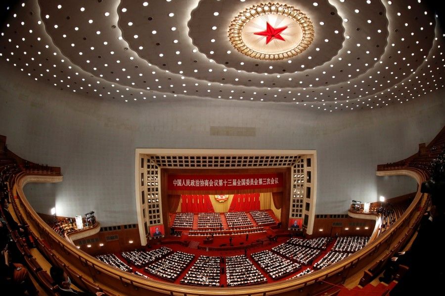 Chinese officials and delegates attend the opening session of the Chinese People's Political Consultative Conference (CPPCC) at the Great Hall of the People in Beijing, 21 May 2020. (Carlos Garcia Rawlins/REUTERS)
