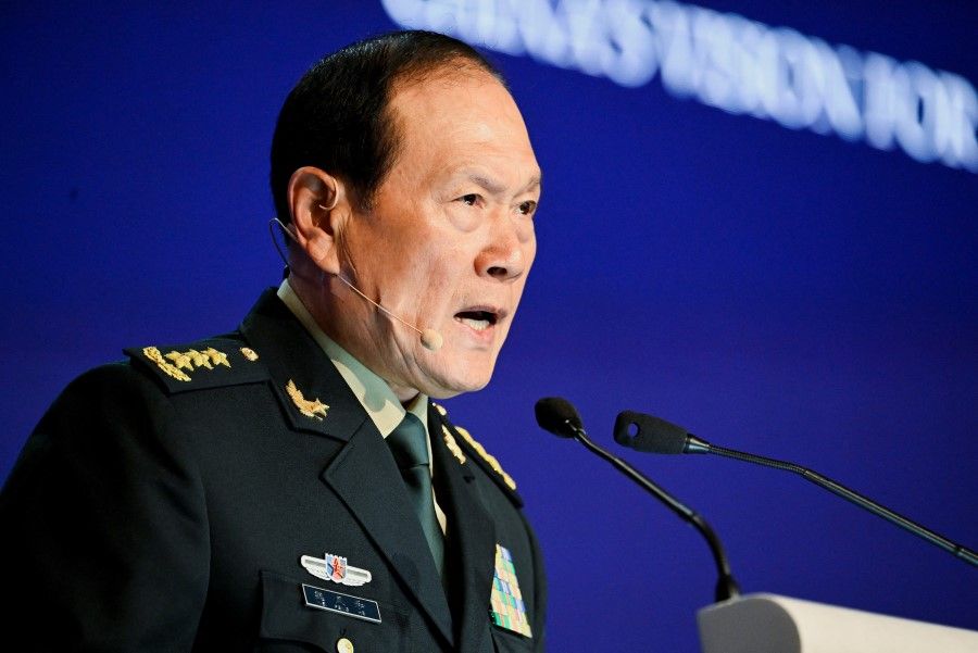 China's State Councilor and Defence Minister General Wei Fenghe speaks at a plenary session during the 19th Shangri-La Dialogue in Singapore, 12 June 2022. (Caroline Chia/Reuters)