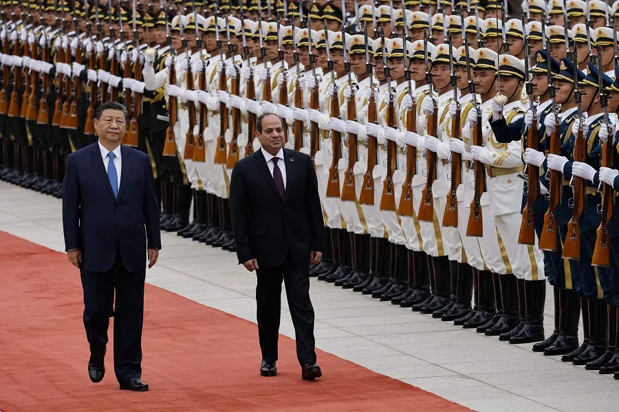 Chinese President Xi Jinping and Egyptian President Abdel Fattah el-Sissi review the honour guard during a welcome ceremony at the Great Hall of the People in Beijing, China, on 29 May 2024. (Tingshu Wang/Pool/AFP)