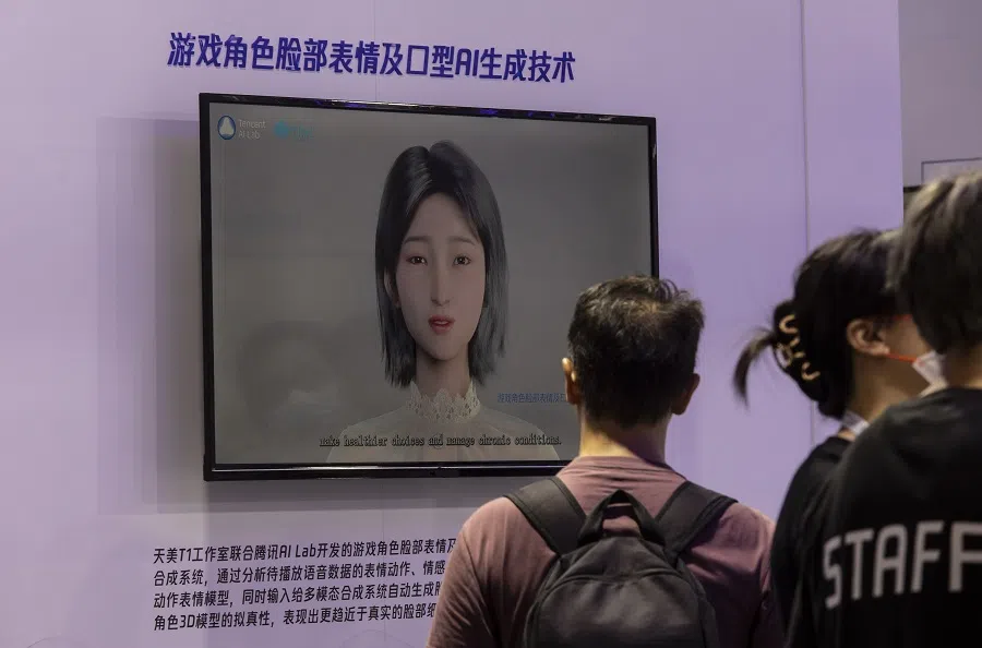 A display on generative AI technology at the Tencent Holdings Ltd. booth at the World Artificial Intelligence Conference (WAIC) in Shanghai, China on 6 July 2023. (Qilai Shen/Bloomberg)
