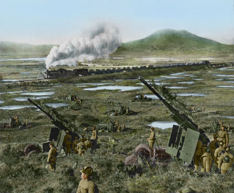 Volunteer artillery troops defending against UNC aircraft, 1951. The volunteers also stepped up rail transport of supplies.