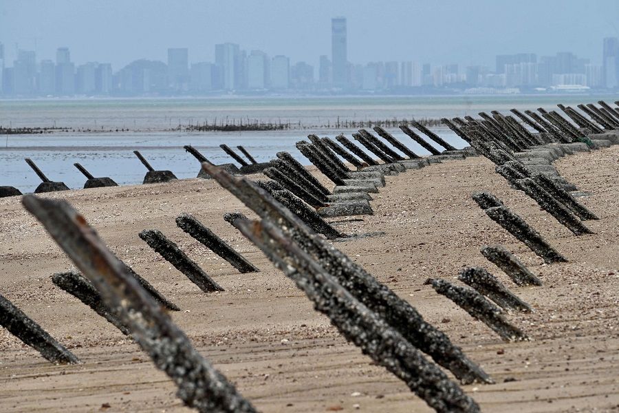 This file photo taken on 20 October 2020 shows anti-landing spikes placed along the coast of Taiwan's Kinmen islands, which lie just 3.2 km (two miles) from the mainland China coast (in background) in the Taiwan Strait. (Sam Yeh/AFP)