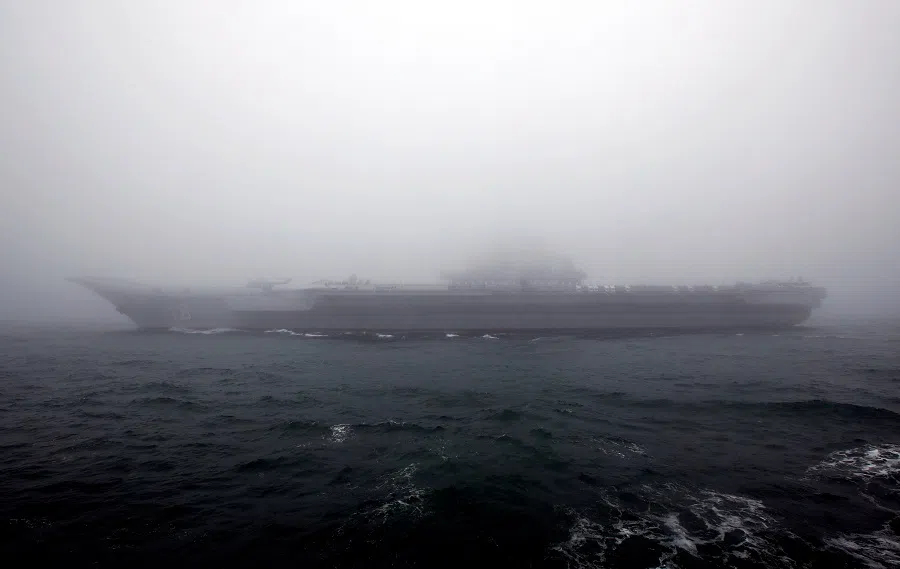 In this file photo taken on 23 April 2019, the Chinese Navy's aircraft carrier Liaoning takes part in a naval parade off the eastern port city of Qingdao, to mark the 70th anniversary of the founding of Chinese People's Liberation Army Navy. (Jason Lee/File Photo/Reuters)