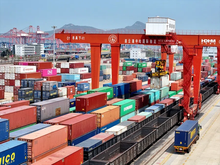 Cargos are uploaded onto a China-Europe freight train at the China-Kazakhstan (Lianyungang) Logistics Cooperation Base in Lianyungang, Jiangsu province, China, 10 April 2025. (China Daily via Reuters)