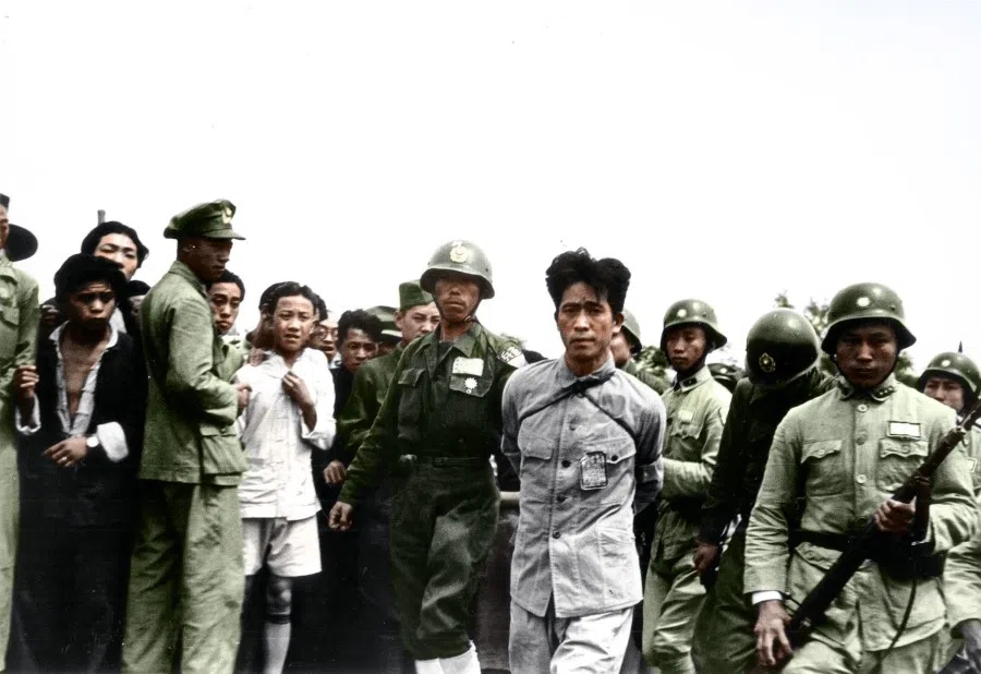 On 11 June 1947, Japanese war criminal Kiyoshi Matsumoto was sentenced to death and escorted to the Yuhuatai execution ground by the military police. During the Japanese invasion of China, Matsumoto indiscriminately killed innocent civilians and subjected non-military personnel to severe torture, exhibiting extreme cruelty and earning the nickname "Tiger of Jiashan". At 11am that day, Matsumoto was brought to the execution ground, where a large crowd of cheering spectators had gathered. He appeared composed but showed signs of weariness.