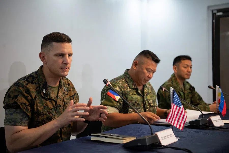 US marines Colonel Jason Armas (left) speaks alongside Philippine marines Commandant Major General Arturo Rojas (centre) and Japanese Major General Toshikatsu Musha (right), commanding General amphibious rapid deployment brigade, during a press conference at the opening ceremony of the “Kamandag” annual military exercise between the US and Philippines in Manila on 26 May 2025. (Ted Aljibe/AFP)