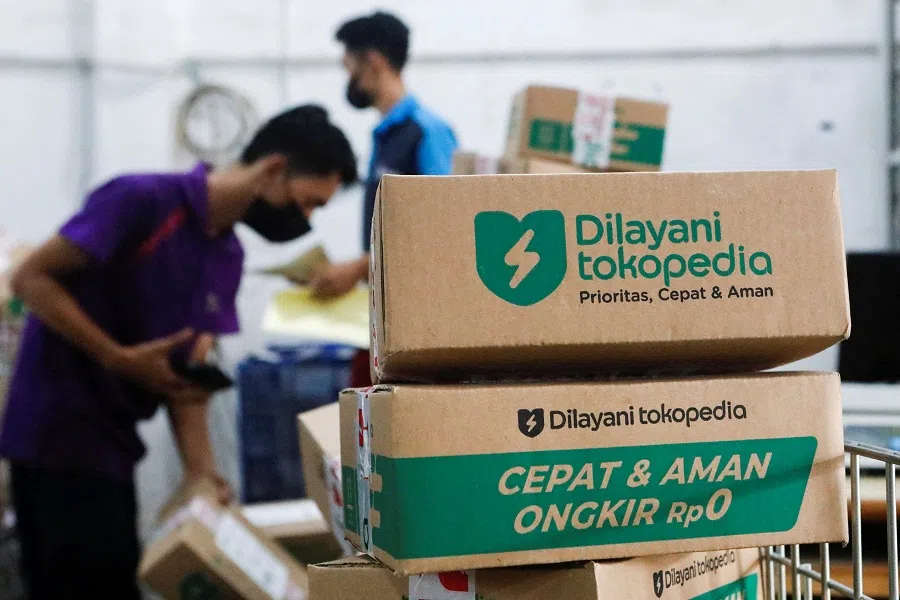 Employees pack goods at Goto's e-commerce unit Tokopedia's warehouse in Jakarta, Indonesia, on 31 August 2022. (Ajeng Dinar Ulfiana/File Photo/Reuters)