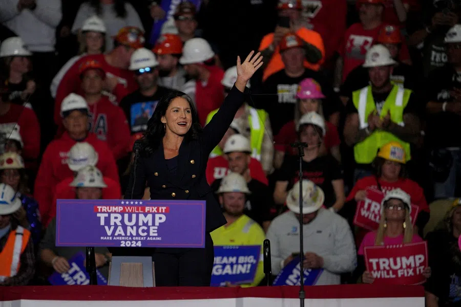 Tulsi Gabbard attends a campaign rally of Donald Trump at PPG Paints Arena in Pittsburgh, Pennsylvania, US, 4 November 2024. (Jeenah Moon/Reuters)
