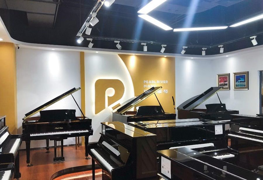 A shot of pianos sold by Pearl River Piano. (Internet)
