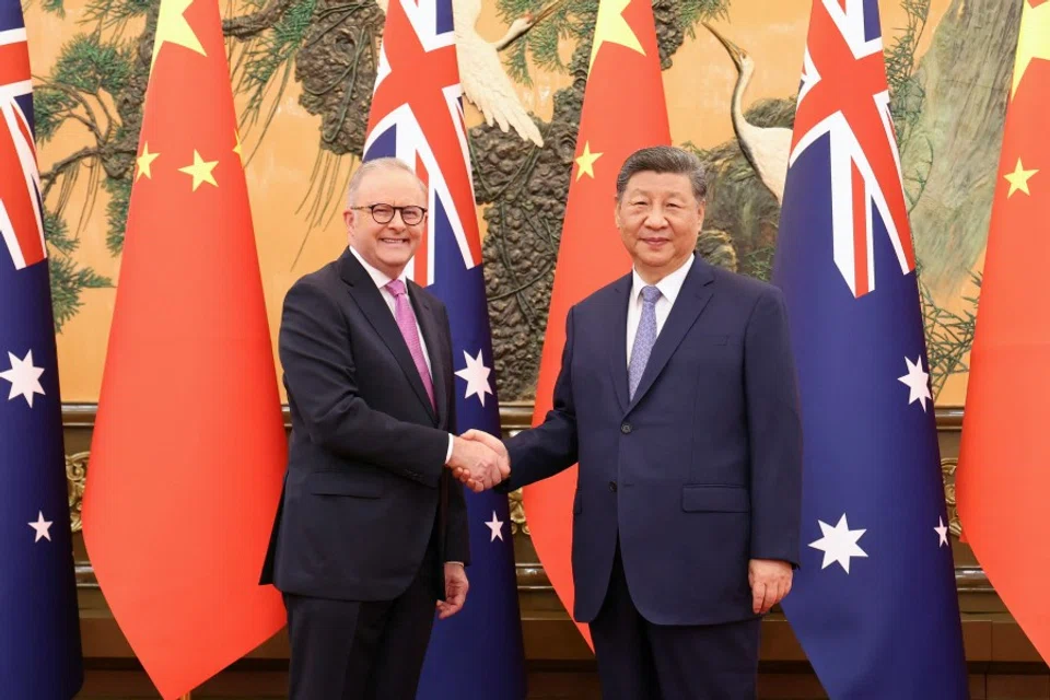 Chinese President Xi Jinping and Australian Prime Minister Anthony Albanese shake hands at the Great Hall of the People in Beijing, China, on 15 July 2025. (China Daily/Reuters)