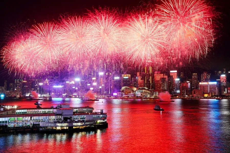 Fireworks light up over Victoria Harbour to celebrate the 77th anniversary of China's National Day, in Hong Kong, China, on 1 October 2026.