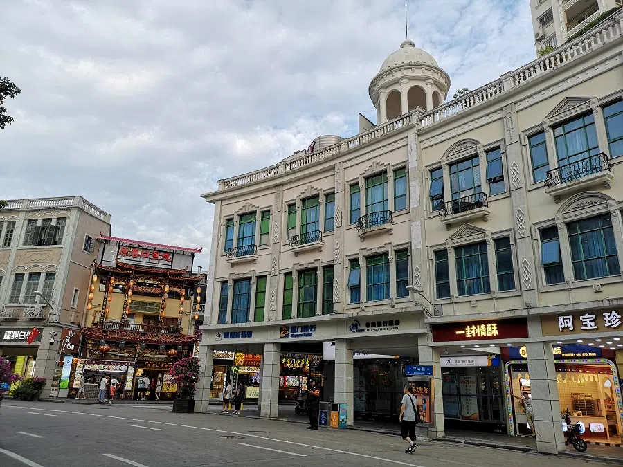 The alleyway buildings retain their historical appearance.