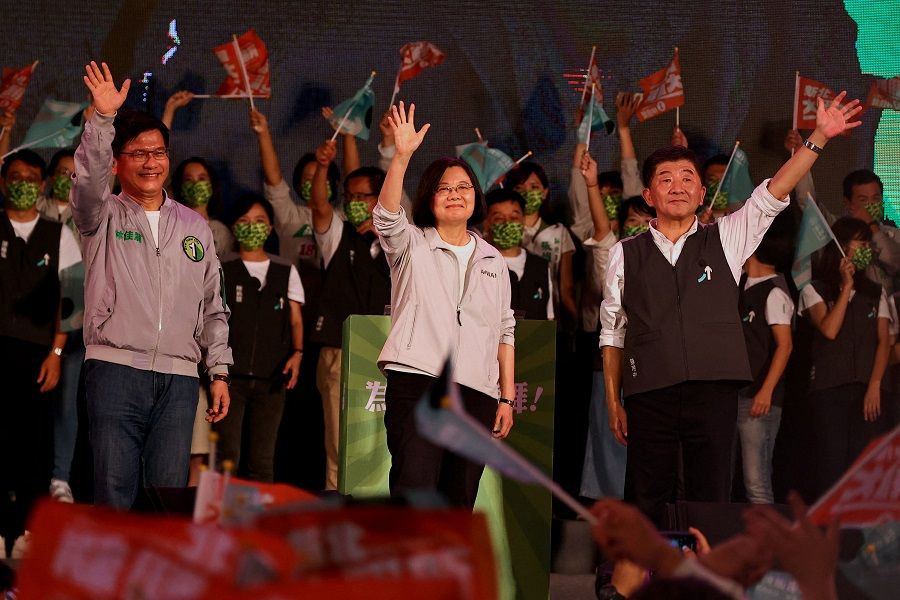Taiwan's President Tsai Ing-wen (centre) waves at the pre-election campaign rally ahead of mayoral elections in Taipei, Taiwan, 12 November 2022. (Ann Wang/Reuters)