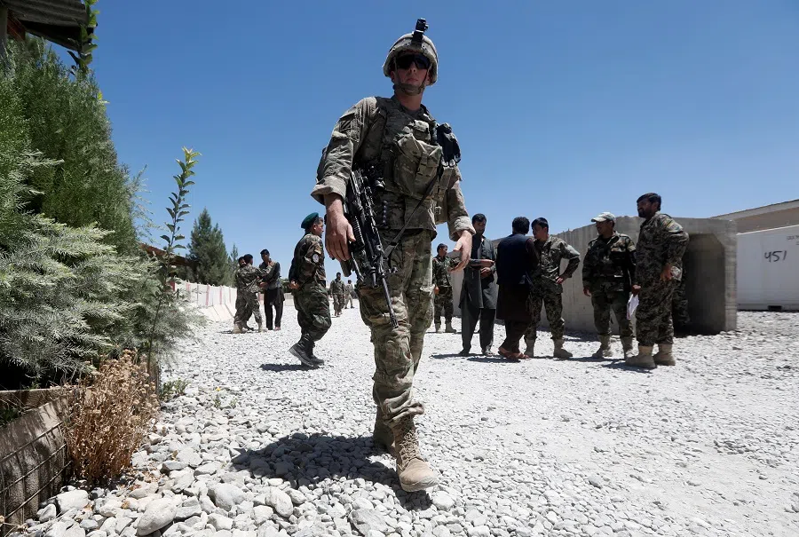 A US soldier keeps watch at an Afghan National Army base in Logar province, Afghanistan, 5 August 2018. (Omar Sobhani/File Photo/Reuters)