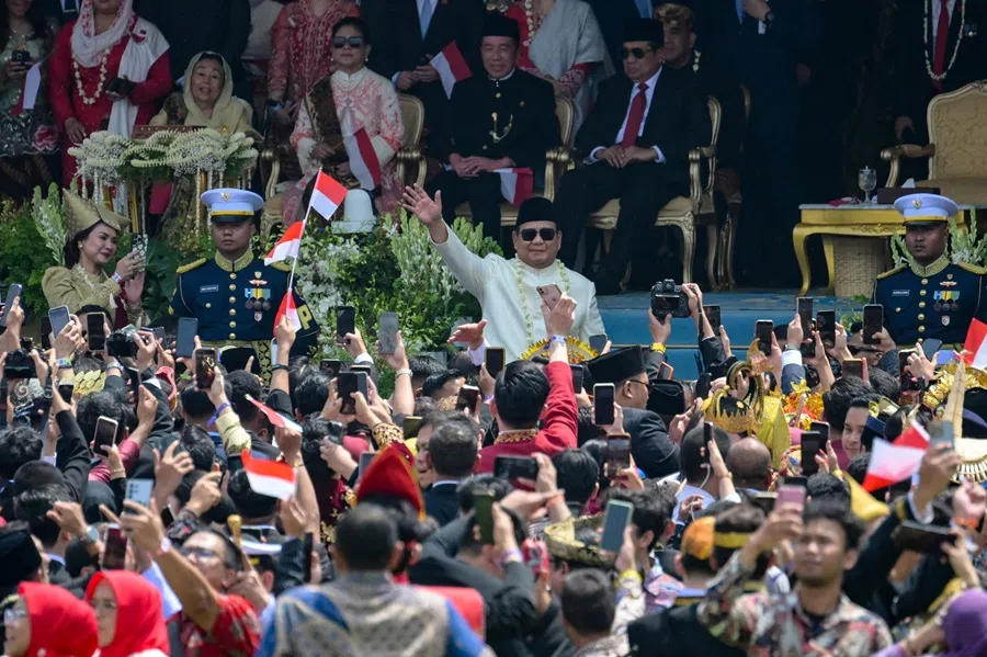 Indonesian President Prabowo Subianto waves to people during a flag raising ceremony marking Indonesia's 80th Independence Day at Merdeka Palace in Jakarta on 17 August 2025. (Bay Ismoyo/AFP)