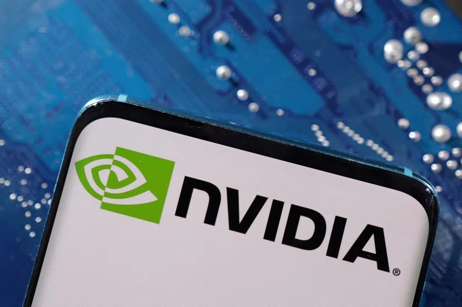 A smartphone with a displayed Nvidia logo is placed on a computer motherboard in this illustration taken 6 March 2023.