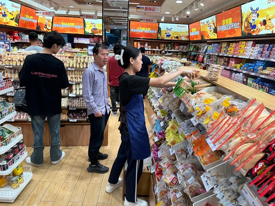 People shop at a bulk snack store in China. (Daryl Lim/SPH Media)