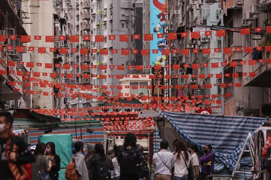 People walk in Temple Street Night Market in Hong Kong, China, 14 February 2023. (SPH Media)