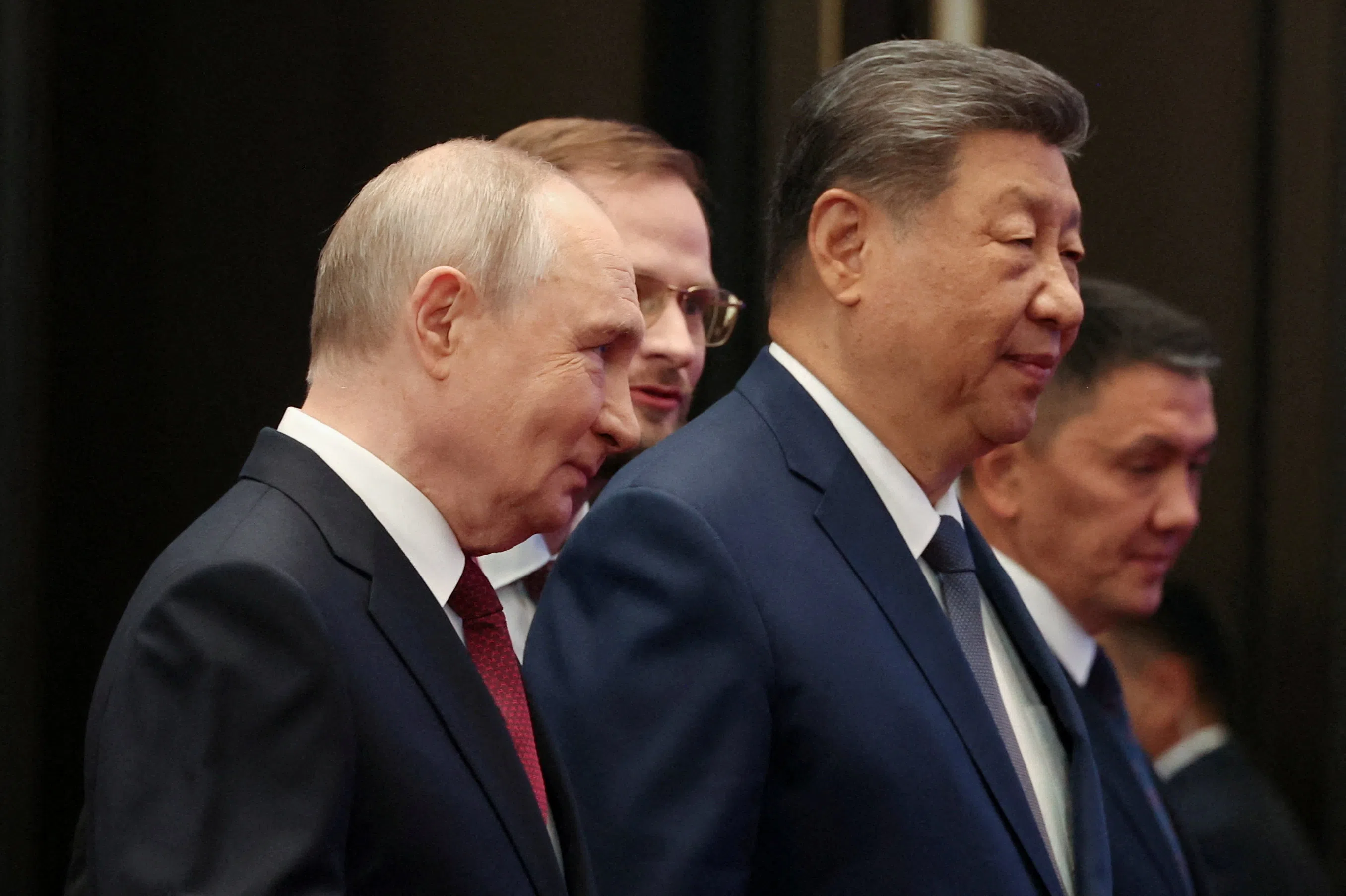 Russian President Vladimir Putin and Chinese President Xi Jinping arrive for a family photo before a session of the Shanghai Cooperation Organisation (SCO) summit in Bishkek, Kyrgyzstan, 1 September 2026.