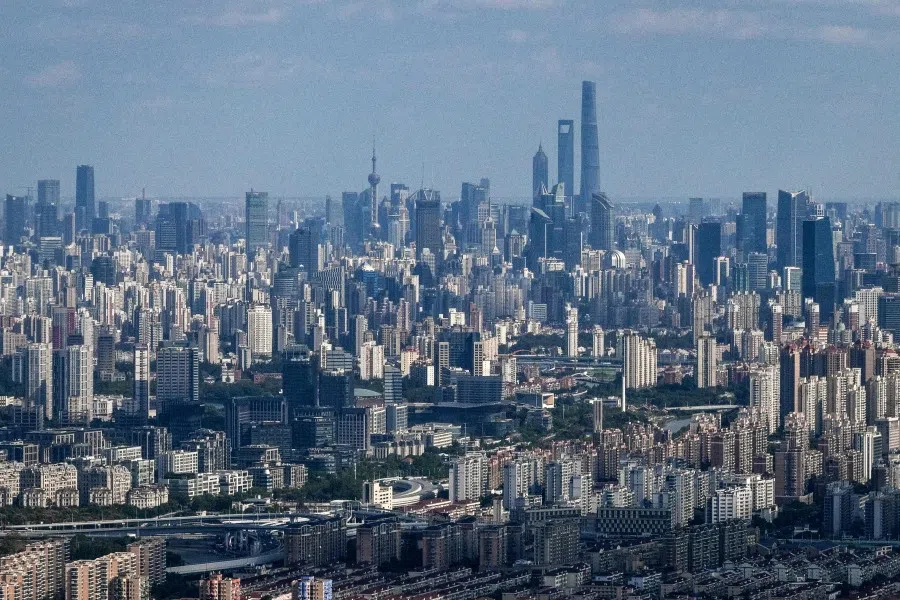 An aerial view of Shanghai taken from a commercial flight taking off at Shanghai Hongqiao International Airport in Shanghai on 28 October 2025. (Hector Retamal/AFP)