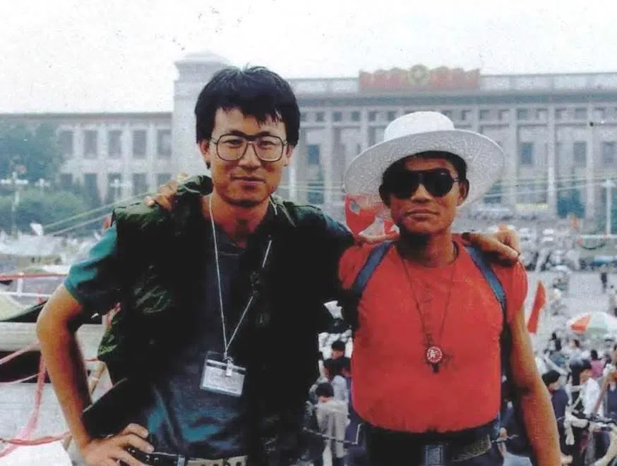 Hsu with the captain of a student patrol unit (right) at the Monument to the People’s Heroes in Tiananmen Square, on 1 June 1989.