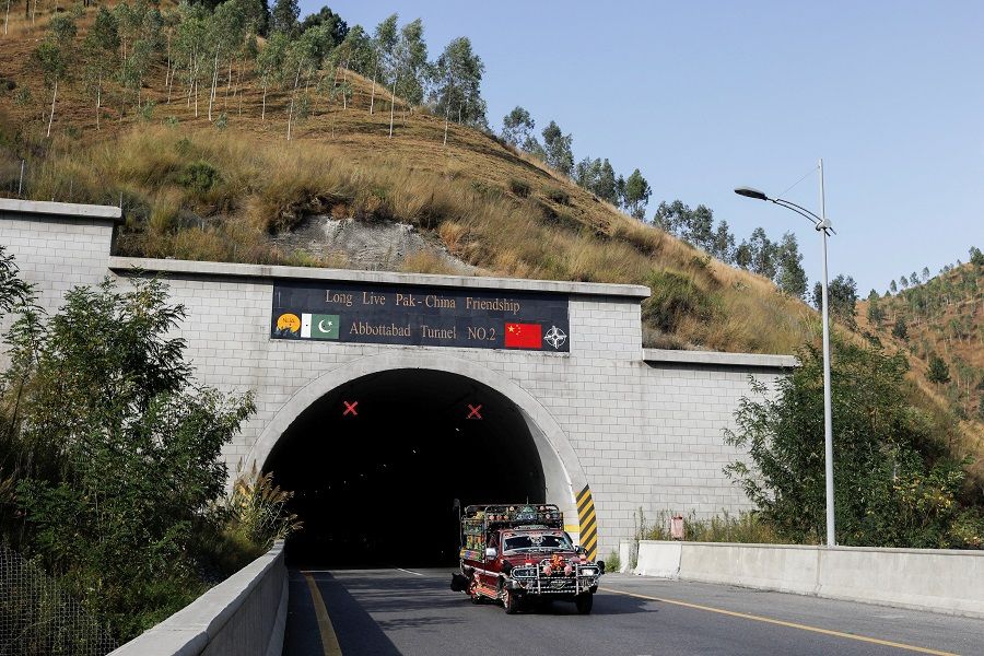 A vehicle passes the Abbottabad Tunnel No 2, which is part of China Pakistan Economic Corridor (CPEC) along Hazara Motorway in Abbottabad, Khyber Pakhtunkhwa province, Pakistan, on 15 October 2023. (Akhtar Soomro/Reuters)
