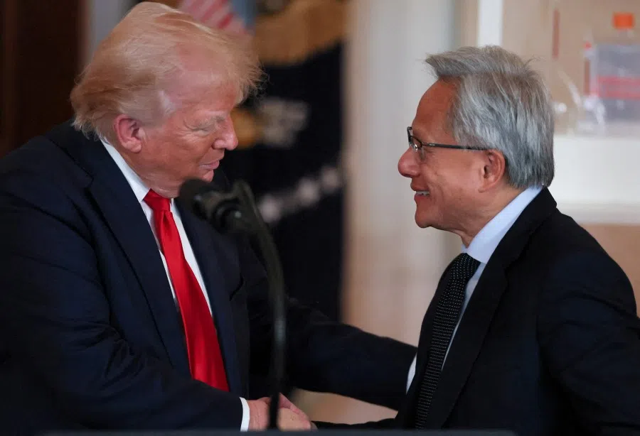 NVIDIA CEO Jensen Huang and US President Donald Trump shake hands at an ‘Investing in America’ event in Washington, DC, US, 30 April 2025. (Leah Millis/Reuters)