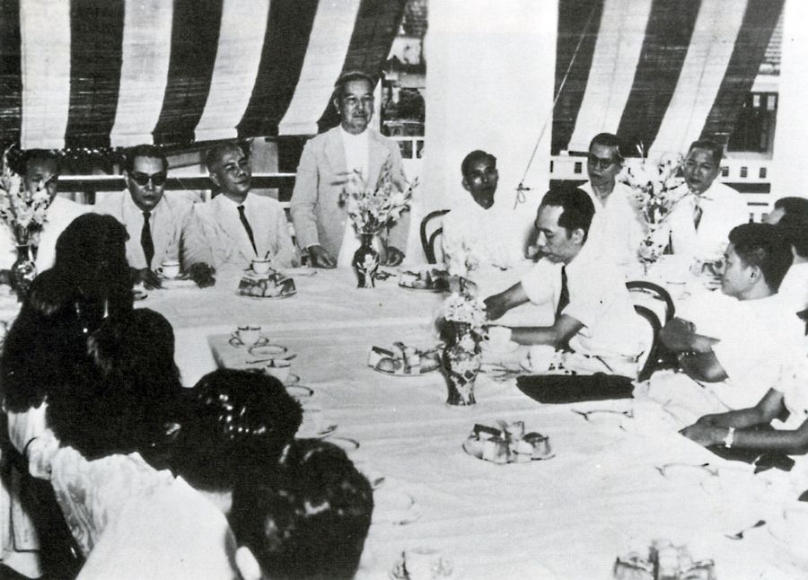 Mr Tan Kah Kee (standing) addressing a gathering of Chinese community leaders in the Ee Hoe Hean Club during the 1930s. (Ee Hoe Hean Club)