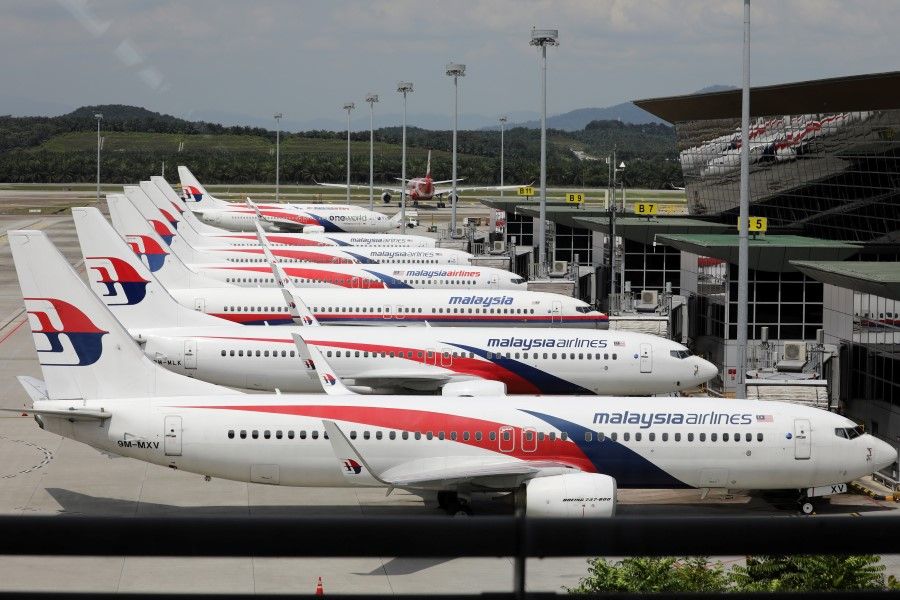 Malaysia Airlines planes are seen parked at Kuala Lumpur International Airport, amid the coronavirus disease (COVID-19) outbreak in Sepang, Malaysia, 6 October 2020. (Lim Huey Teng/REUTERS)