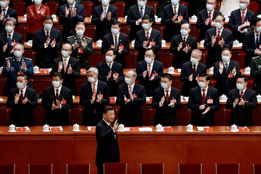 Chinese President Xi Jinping waves as he arrives for the opening ceremony of the 20th Party Congress of the Communist Party of China, at the Great Hall of the People in Beijing, China, 16 October 2022. (Thomas Peter/File Photo/Reuters)