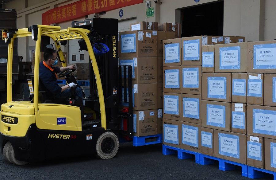 Boxes of donated medical supplies from Chongqing to Italy are seen in this photo taken on 19 March 2020. The note written in both Chinese and Italian on the boxes reads: "Italy, you can do it!" (CNS)