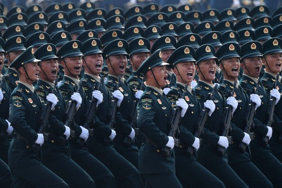 In this file photo taken on October 1, 2019, Chinese troops march during a military parade in Tiananmen Square in Beijing, to mark the 70th anniversary of the founding of the People's Republic of China. (Greg Baker/AFP)