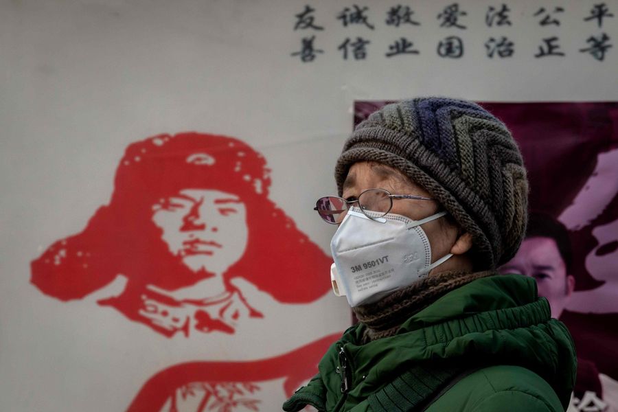 With the Asian giant being the world's second largest economy, no one today will call it a weak country. Yet, the yellow peril ideology does not seem to have disappeared. In this photo taken on 27 January 2020, a woman wearing a protective mask looks on at the Beijing railway station in Beijing. (Nicolas Asfouri/AFP)