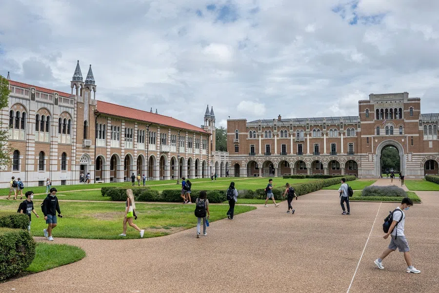 Students walk to class at Rice University on 29 August 2022 in Houston, Texas, US. (Brandon Bell/Getty Images/AFP)