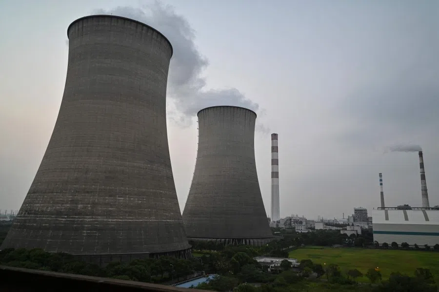 A general view shows the Wujing Coal-Electricity Power Station in Shanghai on 28 September 2021 (Hector Retamal/AFP)
