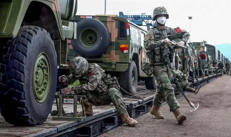 This screen grab obtained from a handout video released by the Russian Defence Ministry on August 29, 2022, shows a Chinese armed convoy upon their arrival for 'Vostok-2022' military exercises at the Sergeevsky training ground at Primorskiy (Maritime) Kray of the Russian Far East. (Handout/Russian Defence Ministry/AFP)