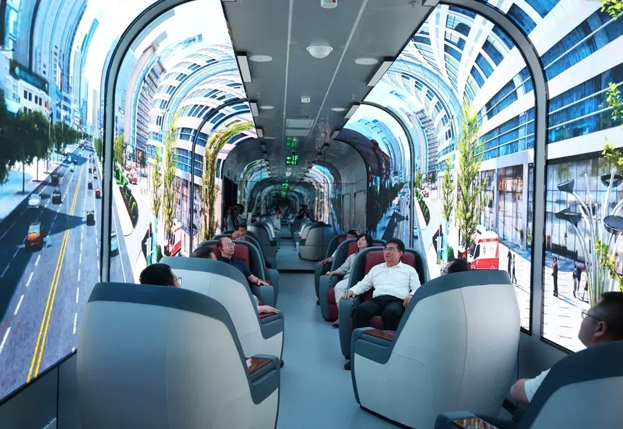 Visitors sit at a display hall of Yinchuan Computing Power Industrial Park, a data centre cluster, in Yinchuan, Ningxia Hui Autonomous Region, China, 2 July 2025.
