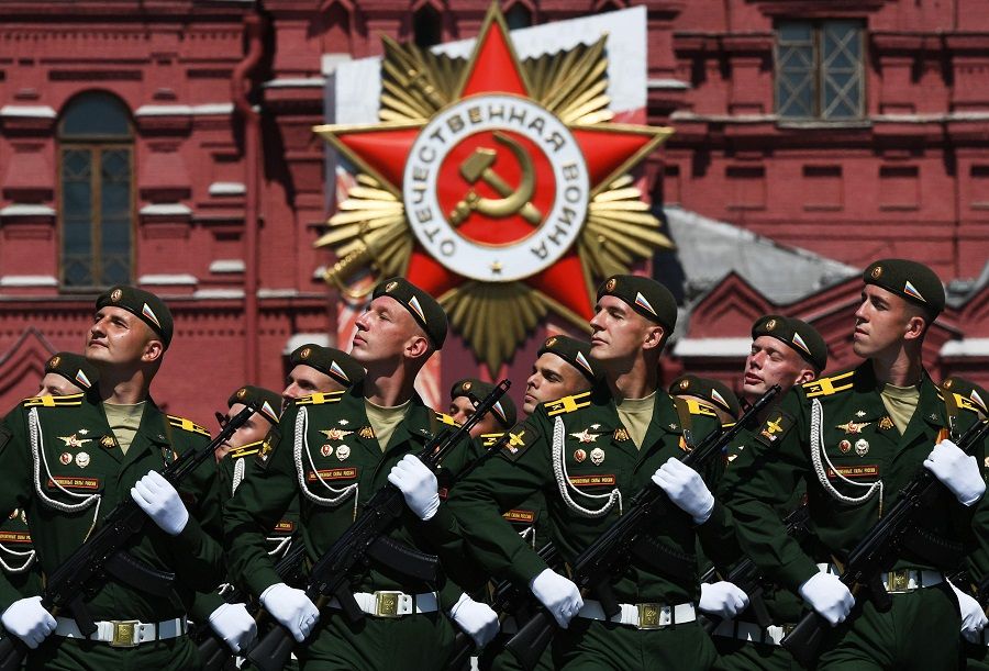 This handout picture provided by Host photo agency shows Russian servicemen marching on Red Square during a military parade, which marks the 75th anniversary of the Soviet victory over Nazi Germany in World War II, in Moscow, on 24 June 2020. (Ramil Sitdikov/Host photo agency/AFP)