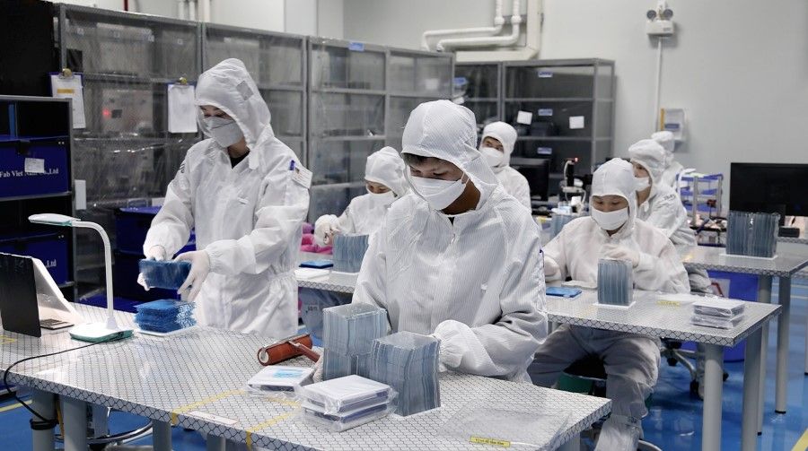 Workers at a facility producing nanochips, Hai Duong province, Vietnam. (SPH Media)