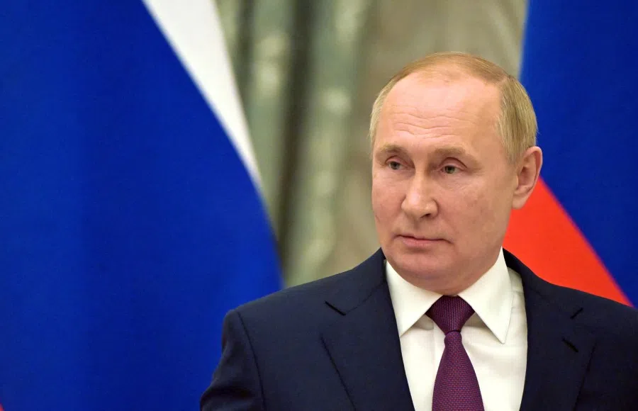 Russian President Vladimir Putin attends a joint news conference with German Chancellor Olaf Scholz in Moscow, Russia, 15 February 2022. (Sputnik/Sergey Guneev/Kremlin via Reuters)