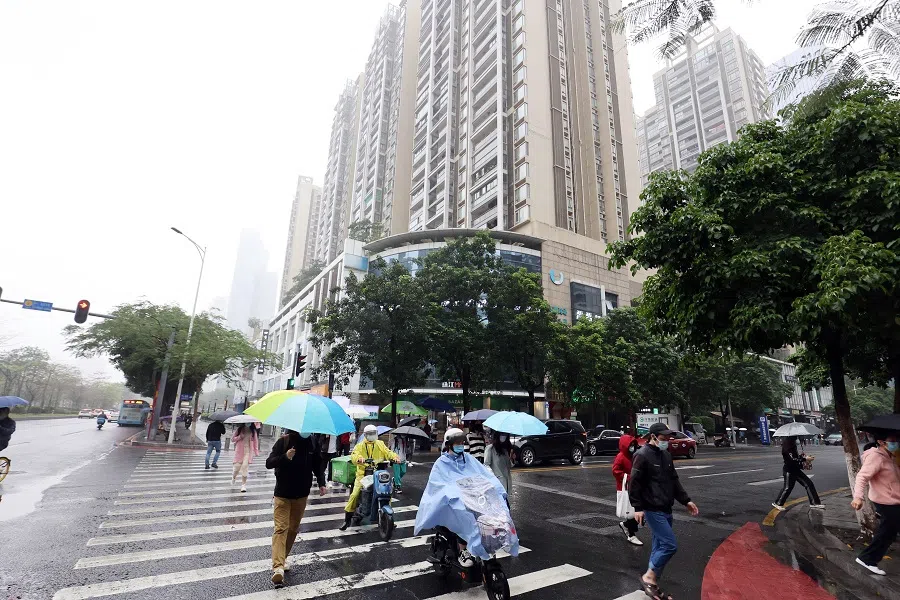 Pedestrians on their way to work in Guangzhou. (SPH Media)