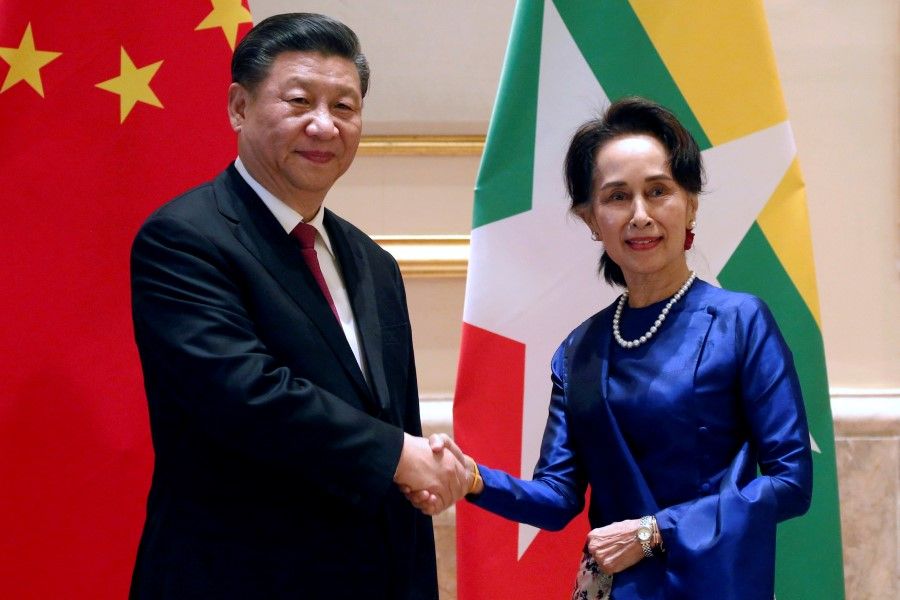 Chinese President Xi Jinping and Myanmar's State Counsellor Aung San Suu Kyi shake hands at the Presidential Palace in Naypyitaw, Myanmar January 17, 2020. (Ann Wang/Reuters)