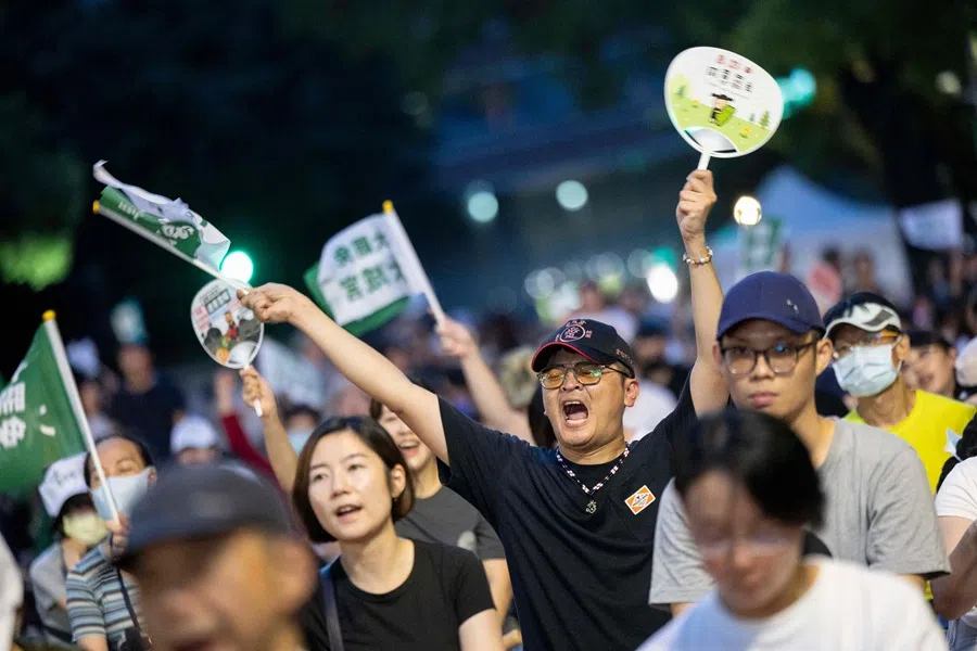 Supporters of the recall election await the results in Taipei on 26 July 2025.