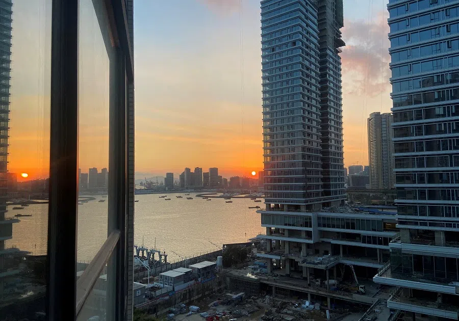Under-construction apartments are pictured from a building during sunset in the Shekou area of Shenzhen, Guangdong province, China, 7 November 2021. (David Kirton/File Photo/Reuters)