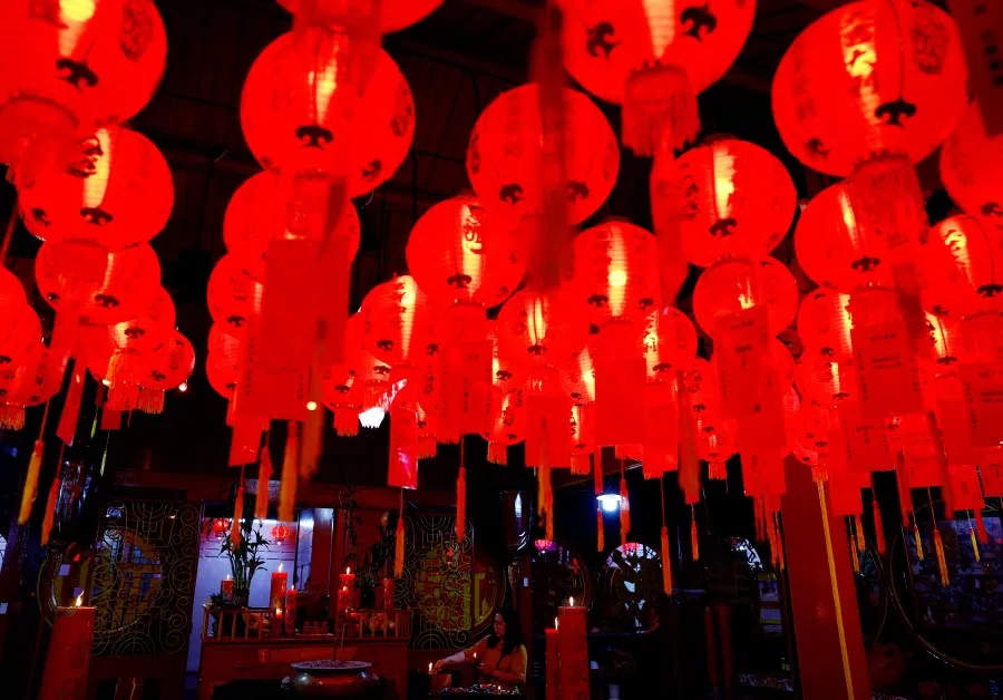 A worshipper burns incense on the first day of the year of the Dragon, amid Lunar New Year celebrations, at Petak Sembilan temple in Jakarta, Indonesia, on 10 February 2024. (Kim Kyung-Hoon/Reuters)