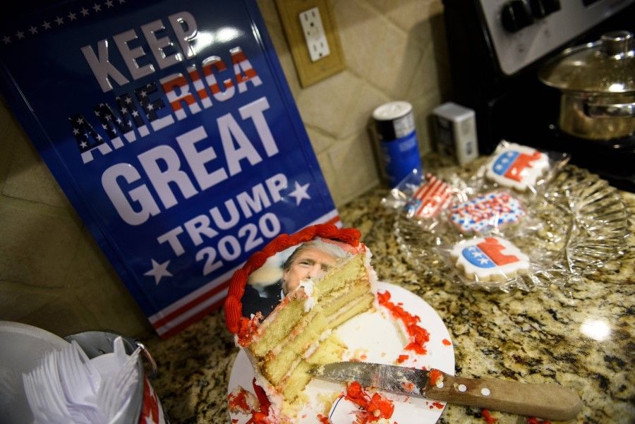 A President Donald Trump cake lays on the counter of a home on 3 November 2020 in St. Pauls, North Carolina, United States. (Melissa Sue Gerrits/Getty Images/AFP)