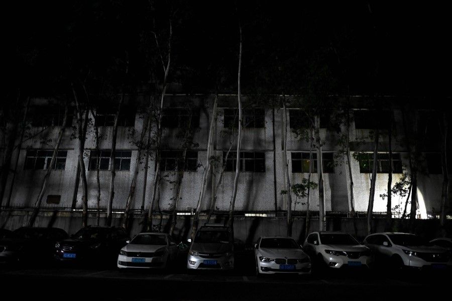 This picture shows a building of an industrial park in Houjie, in Dongguan China's southern Guangdong province on 30 September 2021, an area hit by power restrictions. (Noel Celis/AFP)