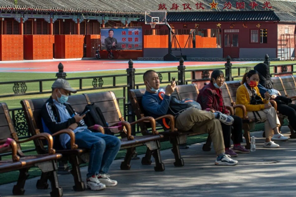 A banner featuring a portrait of Chinese President Xi Jinping at a People's Liberation Army (PLA) Flag Guard barrack near the Forbidden City in Beijing, China, on 11 October 2022. (Bloomberg)