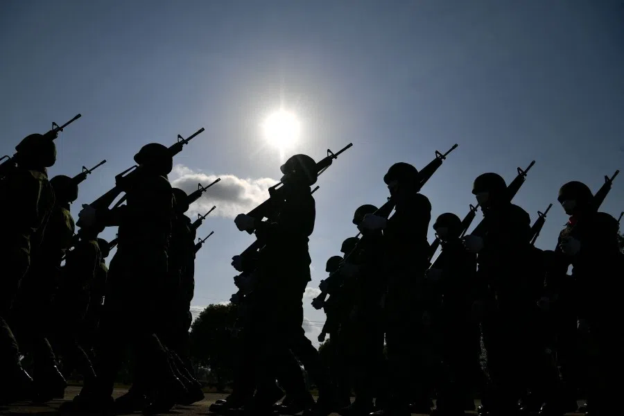 Thai soldiers march during celebrations to mark Royal Thai Armed Forces Day at Chulabhorn Camp in the southern Thailand province of Narathiwat on 18 January 2022. (Madaree Tohlala/AFP)