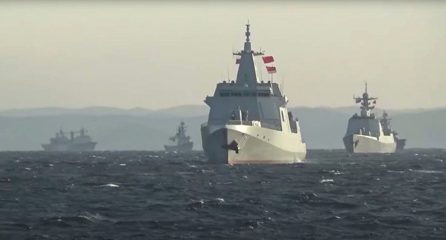 A group of naval vessels from China and Russia sails during joint military drills in the Sea of Japan, in this still image taken from video released on 18 October 2021. Video released 18 October 2021. (Russian Defence Ministry/Handout via Reuters)